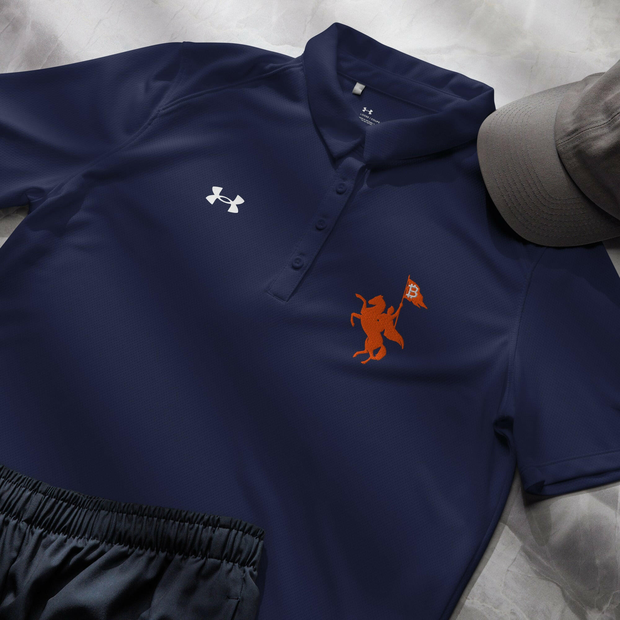 Soft Revolution / Under Armour® Women’s Bitcoin Polo - Nikki Nakamoto - The Orange Habit