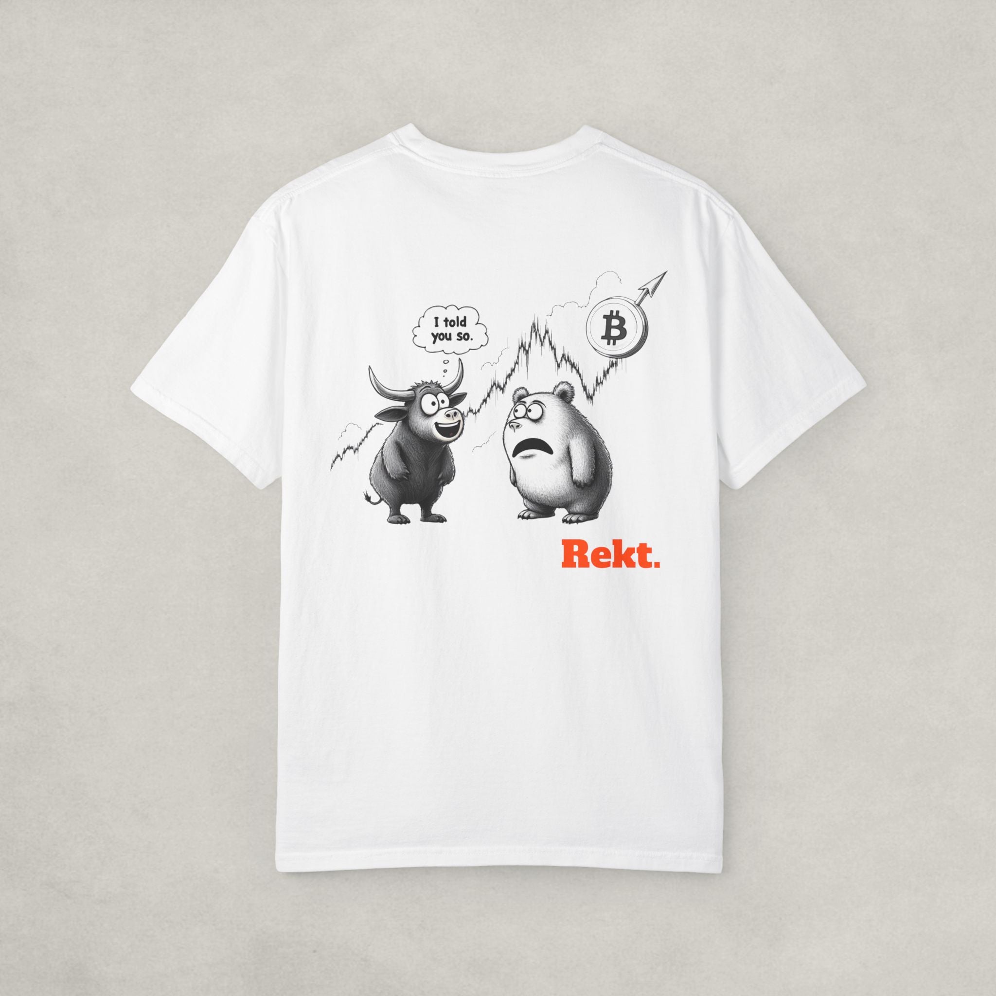 Back of the white t-shirt by SVRNT with 'REKT' printed in orange on a light gray background | The Orange Habit